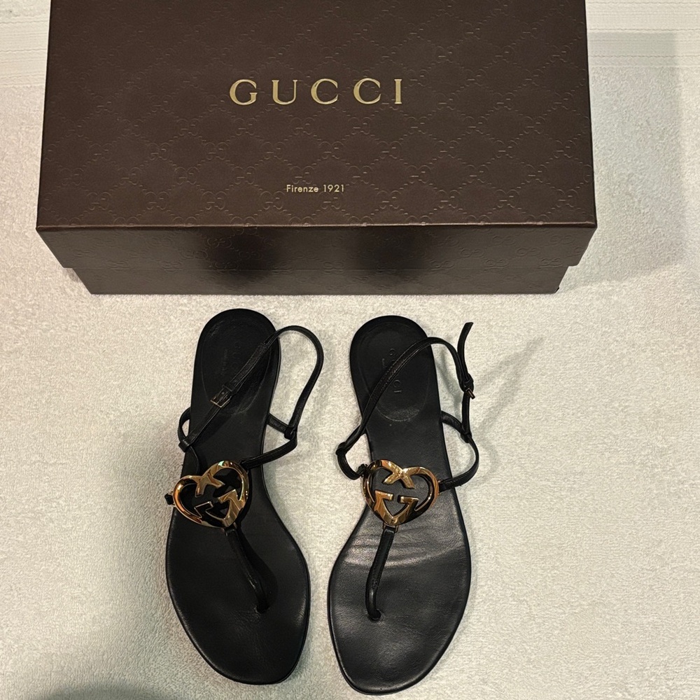 Gucci Black Sandals with Gold Emblem